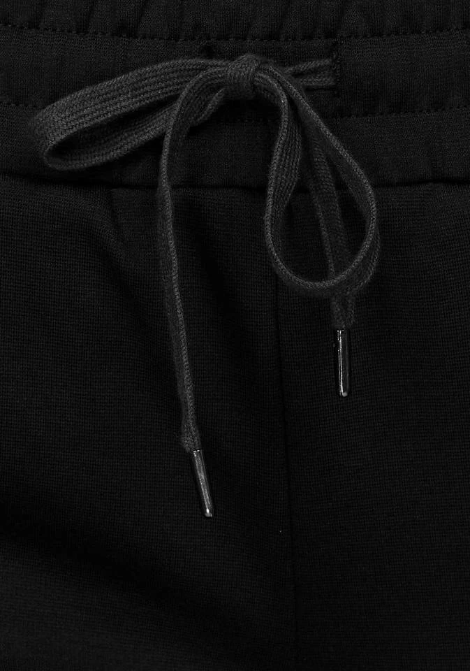 Bench. Relaxhose mit schmalem Bein und Zipper am Saum 10 Bench. Relaxhose mit schmalem Bein und Zipper am Saum – Bild 8